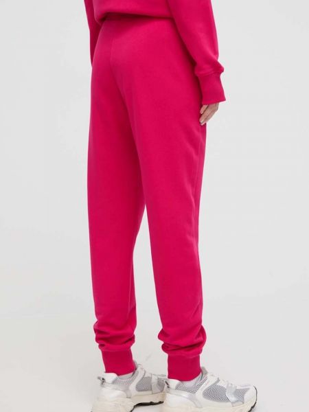 Sportovní kalhoty s aplikacemi Versace Jeans Couture růžové