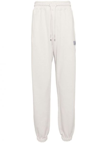 Bavlnené teplákové nohavice s potlačou Les Benjamins sivá