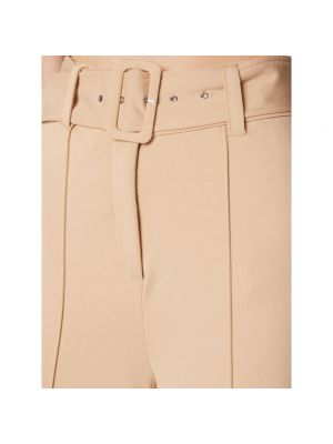 Pantalones de cintura alta de cuero elegantes Guess beige