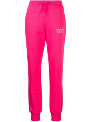 Haftowane spodnie sportowe bawełniane Versace Jeans Couture różowe