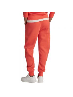 Спортивные штаны со звездочками G-star оранжевые