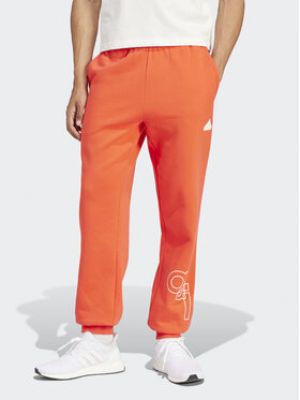 Pantalon de joggings à imprimé Adidas rouge