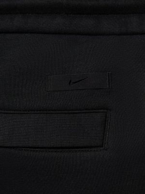 Slim fit fleecové priliehavé teplákové nohavice Nike čierna