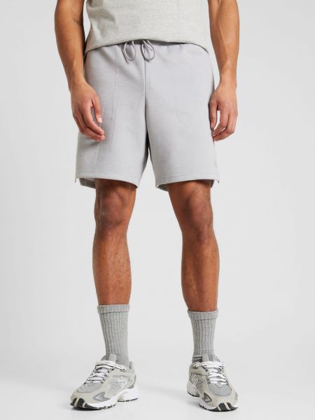 Pantalon de sport New Balance gris