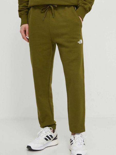 Spodnie sportowe z nadrukiem The North Face zielone