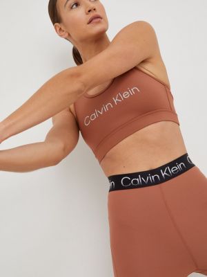 Sportovní podprsenka Calvin Klein Performance Ck Essentials hnědá barva
