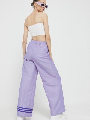 Kalhoty s aplikacemi Adidas Originals fialové