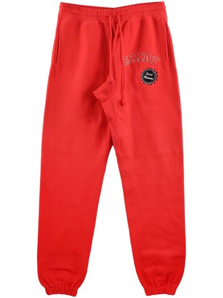 Bavlnené teplákové nohavice s potlačou Saint Mxxxxxx červená