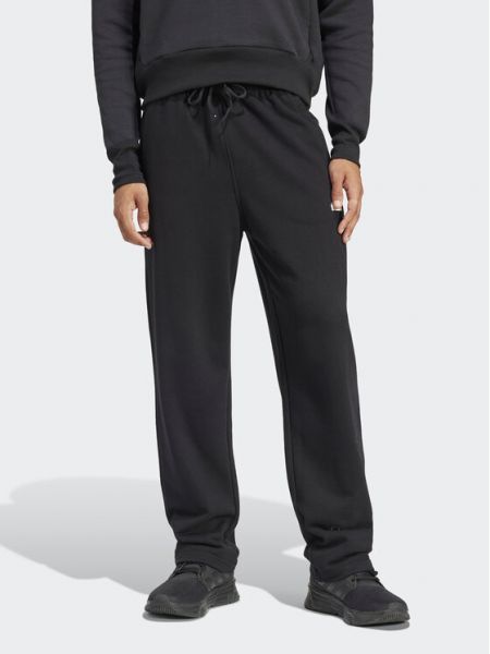 Priliehavé teplákové nohavice s výšivkou Adidas čierna