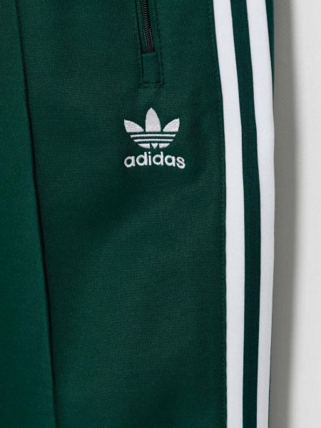 Sportovní kalhoty s potiskem Adidas Originals zelené
