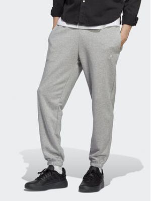 Sportovní kalhoty Adidas šedé