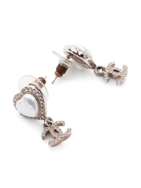 Boucles d'oreilles à imprimé à boucle de motif coeur Chanel Pre-owned argenté