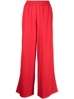 Spodnie sportowe relaxed fit Adidas czerwone