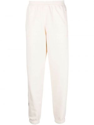 Pantalon de joggings slim à rayures Adidas blanc