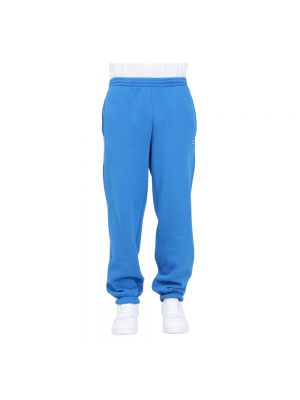 Spodnie sportowe Lacoste niebieskie