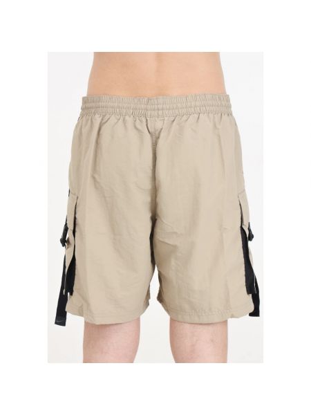 Pantalones cortos cargo con bolsillos de playa Nike beige
