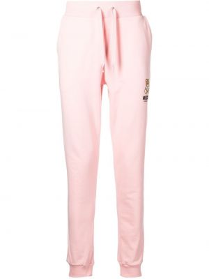 Sportovní kalhoty s potiskem Moschino růžové
