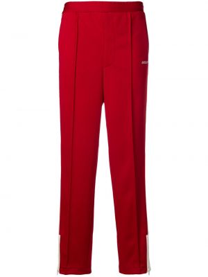 Pruhované sportovní kalhoty Ambush červené