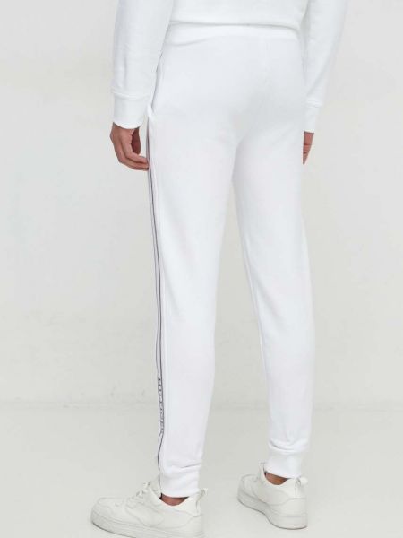 Sportovní kalhoty s aplikacemi Tommy Hilfiger bílé