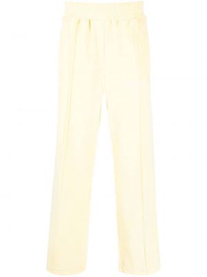 Pruhované sportovní kalhoty Palm Angels žluté