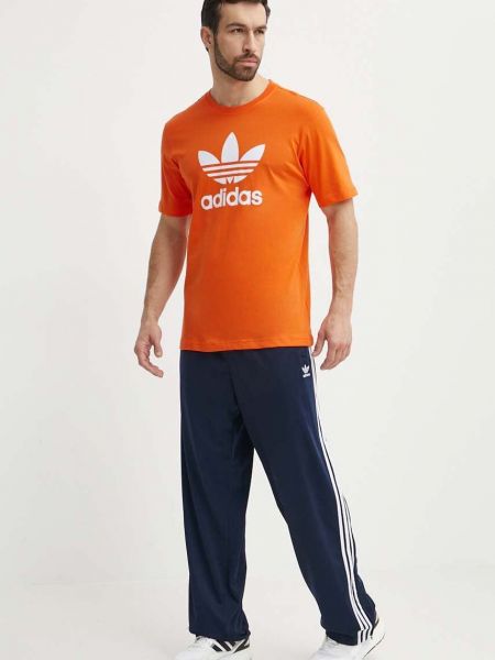 Donji dio trenirke s printom Adidas Originals plava