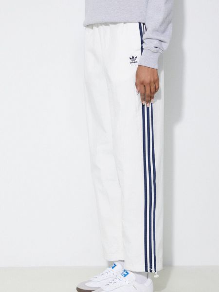 Spodnie sportowe Adidas Originals beżowe