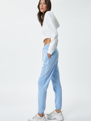 Памучни спортни панталони с принт с джобове Koton синьо