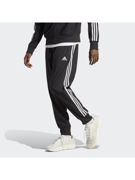 Spodnie sportowe w paski plecione Adidas