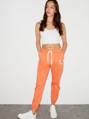 Спортни панталони Grimelange оранжево