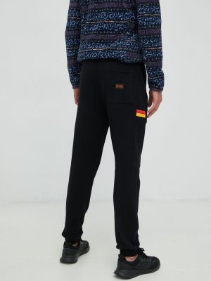 Sportovní kalhoty s aplikacemi Rip Curl černé