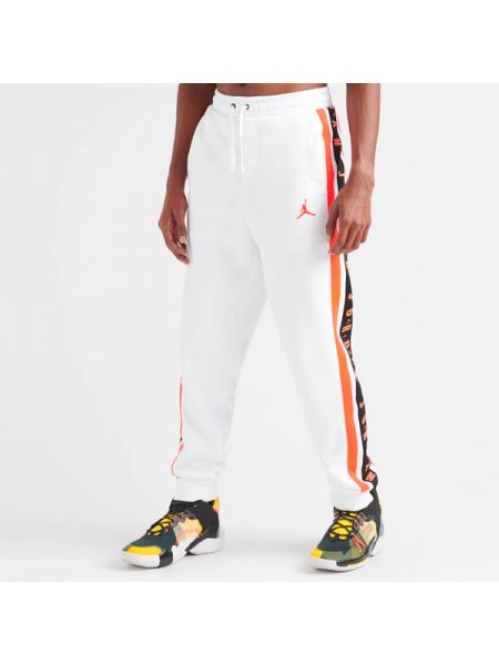 Флисовые спортивные штаны свободного кроя Nike белые