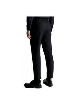 Pantalones chinos de lana de cachemir con estampado de cachemira Calvin Klein negro