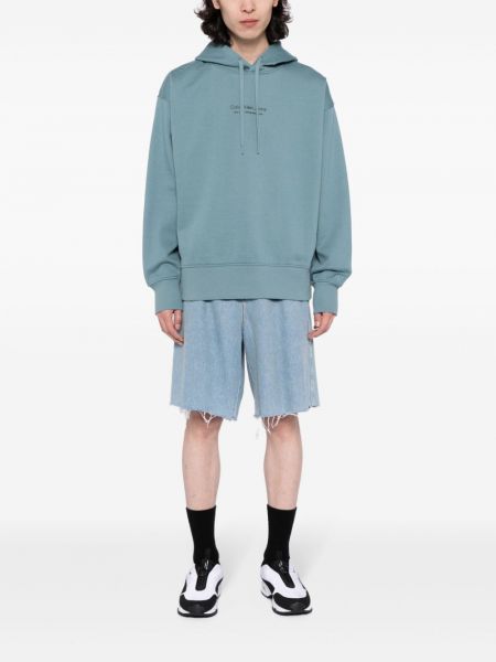 Kapučdžemperis ar apdruku Calvin Klein zils
