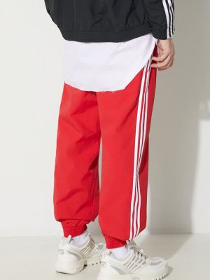 Fonott sport nadrág Adidas Originals piros