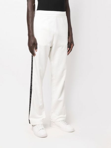 Sportovní kalhoty s potiskem Moncler bílé