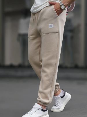 Sportovní kalhoty s kapsami Madmext béžové