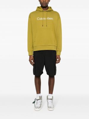 Bluza z kapturem bawełniana Calvin Klein zielona
