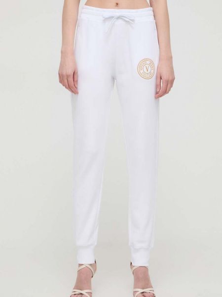 Однотонные хлопковые спортивные штаны Versace Jeans Couture белые