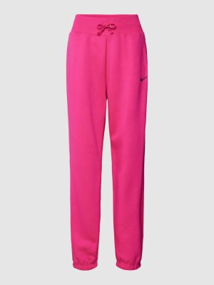 Spodnie sportowe Nike różowe