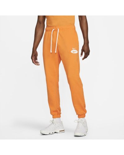 Męskie joggery z dzianiny dresowej Nike Sportswear Swoosh League - Pomarańczowy