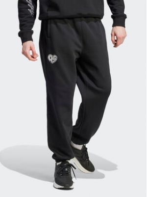 Спортивные штаны свободного кроя Adidas Sportswear черные