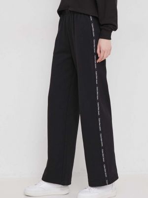 Sportovní kalhoty s aplikacemi Calvin Klein Jeans černé