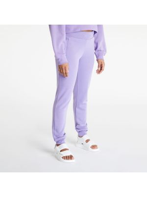 Sportovní kalhoty Adidas Originals fialové