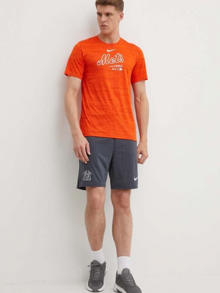 Koszulka z nadrukiem Nike pomarańczowa