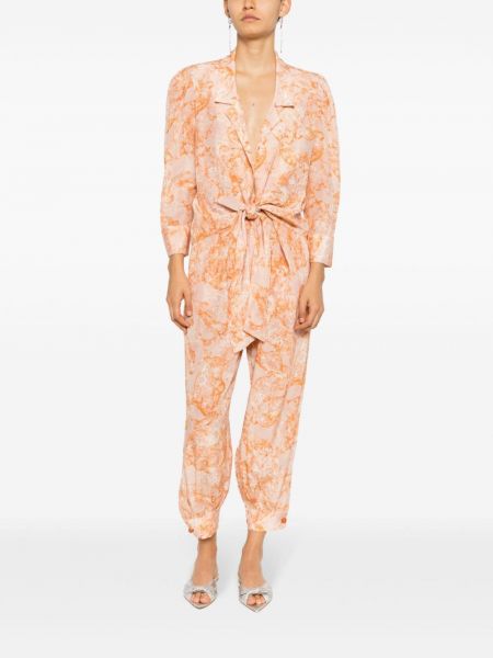 Jedwabne spodnie z nadrukiem w abstrakcyjne wzory Adriana Degreas pomarańczowe