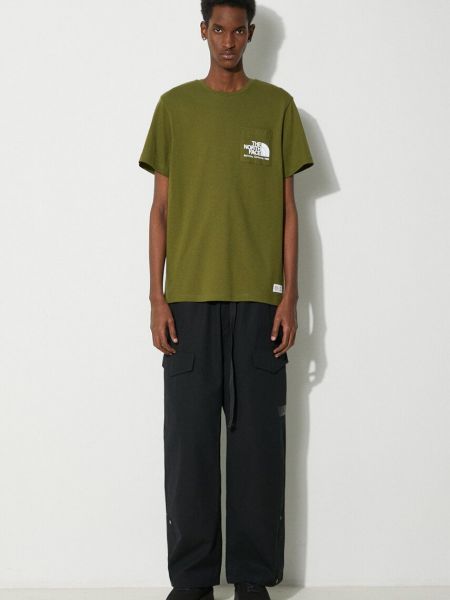 Pamučna majica s džepovima The North Face zelena