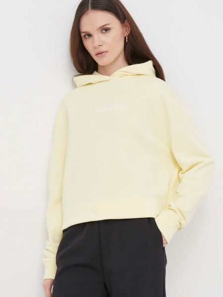 Bluza z kapturem bawełniana z nadrukiem Calvin Klein żółta