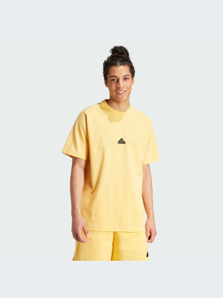 Бавовняна футболка Adidas помаранчева
