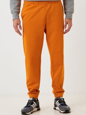 Спортивные штаны Demix оранжевые