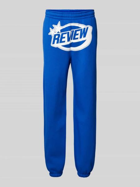 Spodnie sportowe z nadrukiem Review niebieskie